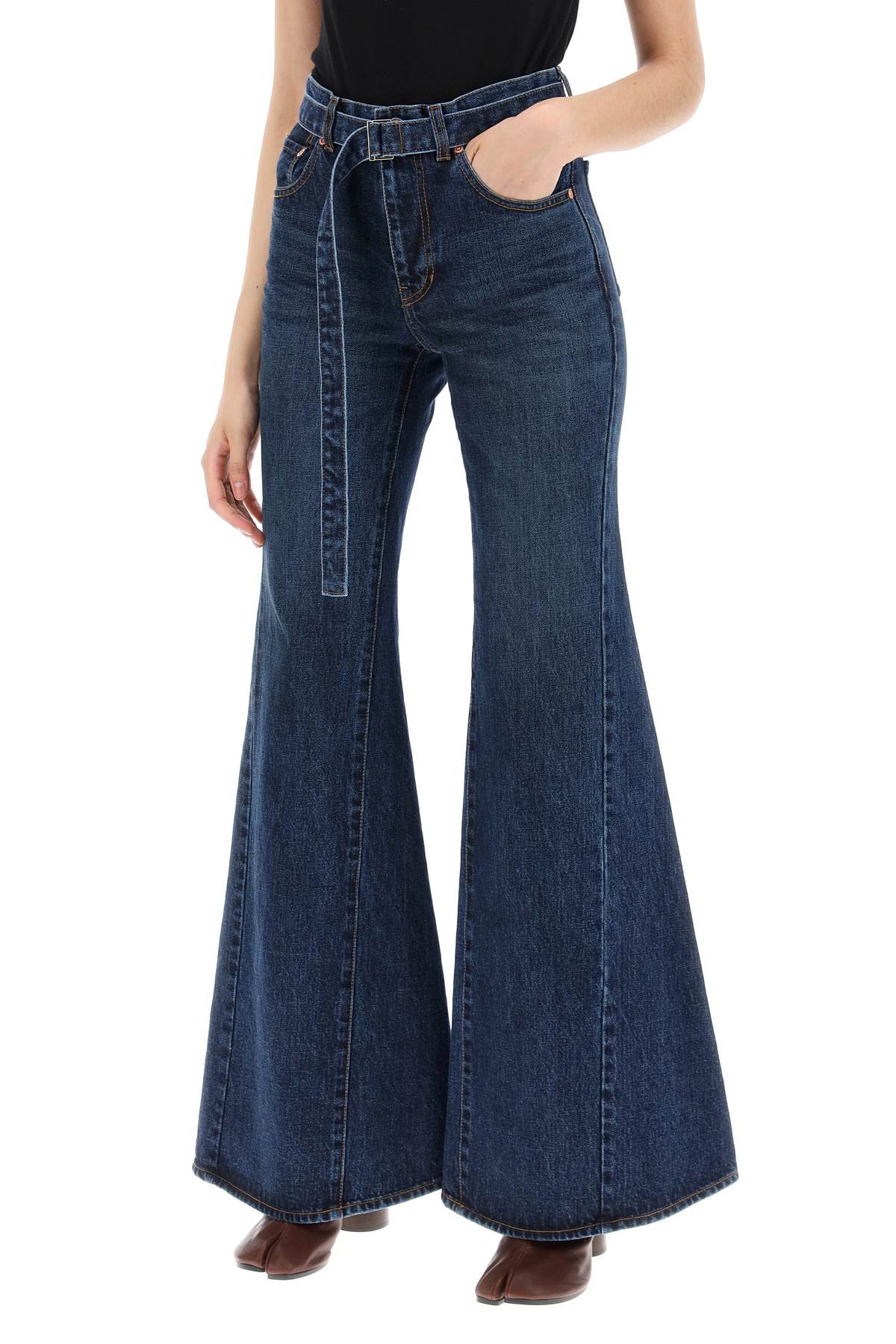 Sacai boot cut jeans with matching belt