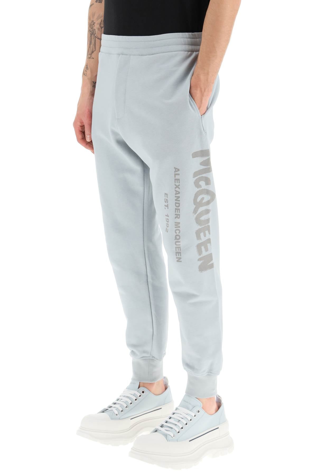 Alexander Mcqueen Mcqueen Graffiti Sweatpants   Light Blue