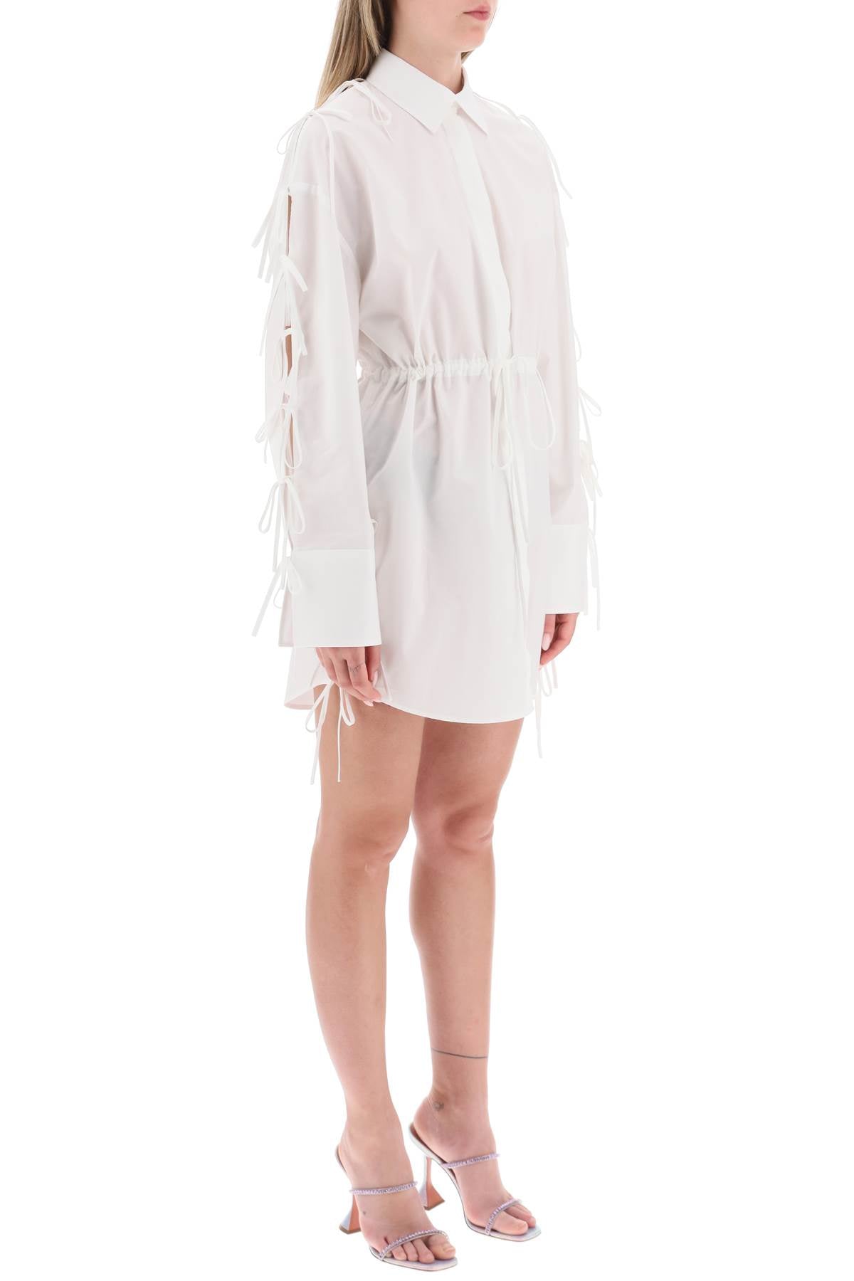 Msgm mini shirt dress with cut-outs and bows - ALPHA PANTHEON Opulencia Elegante | Unveiling the Premier Destination for Designer Fashion & Luxury Apparel