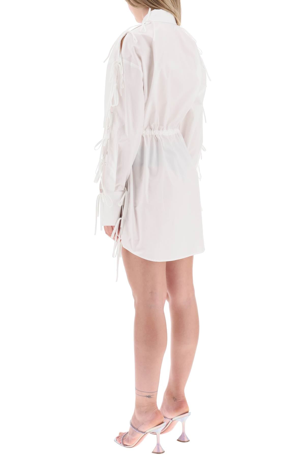 Msgm mini shirt dress with cut-outs and bows - ALPHA PANTHEON Opulencia Elegante | Unveiling the Premier Destination for Designer Fashion & Luxury Apparel