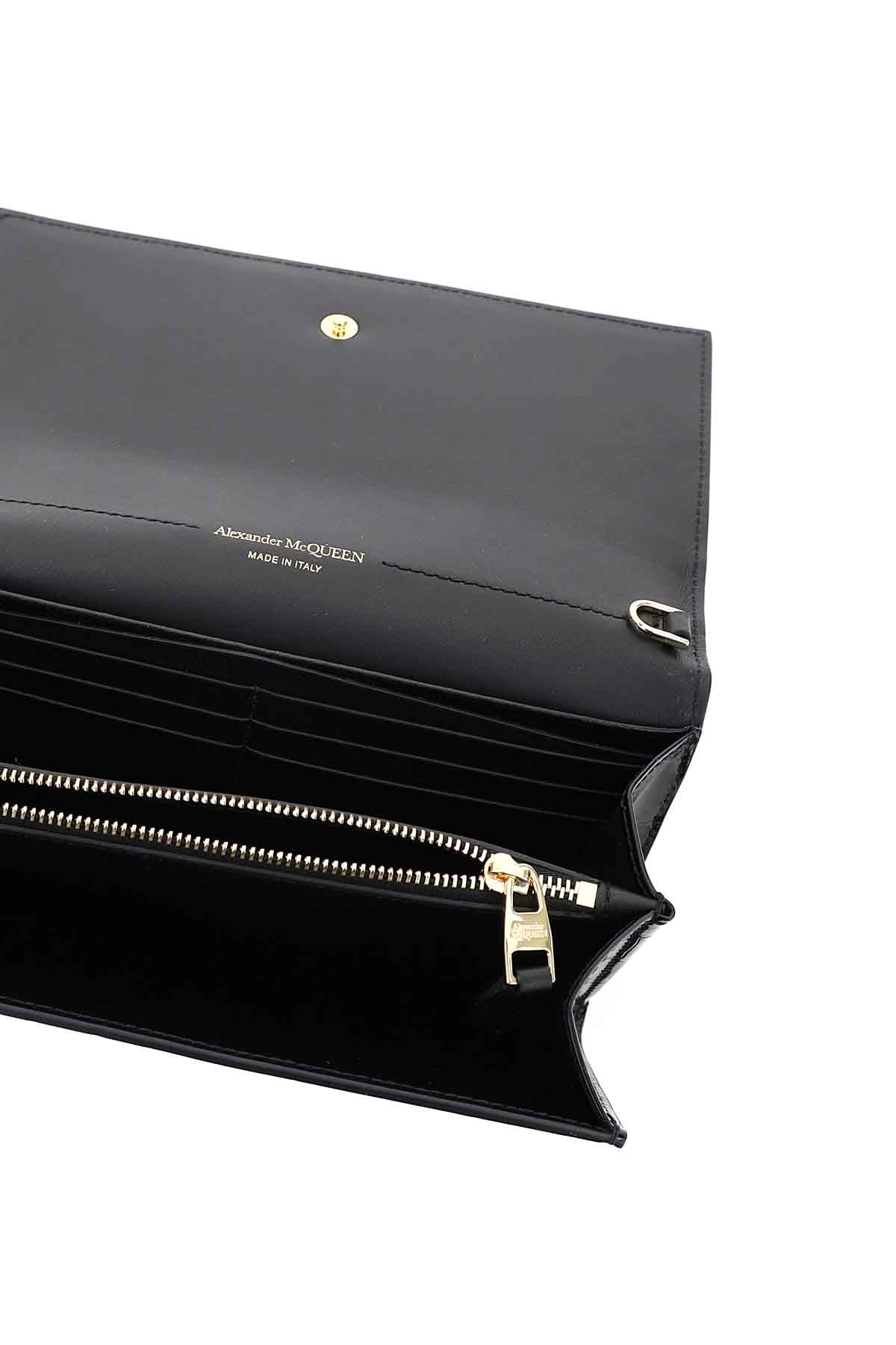 Alexander mcqueen croco-embossed leather mini skull clutch