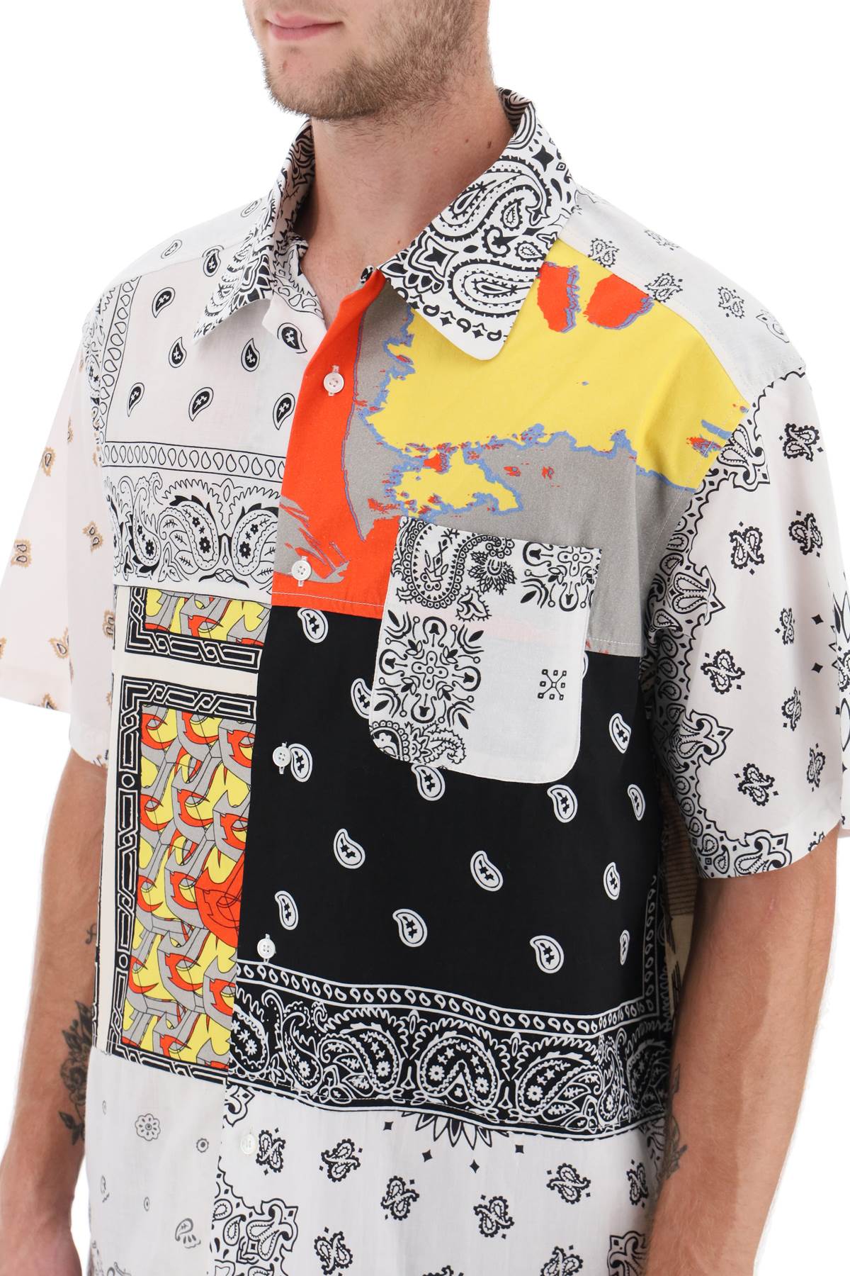 Children of the discordance short-sleeved patchwork shirt - ALPHA PANTHEON Opulencia Elegante | Unveiling the Premier Destination for Designer Fashion & Luxury Apparel